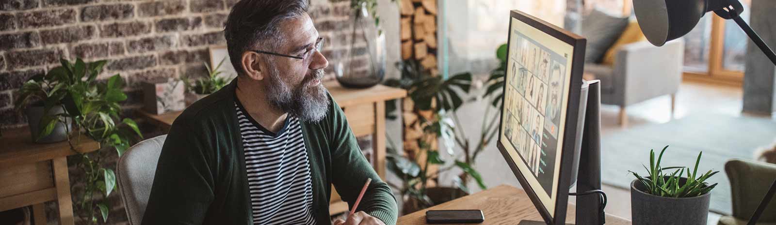 Business person working from home on their computer.