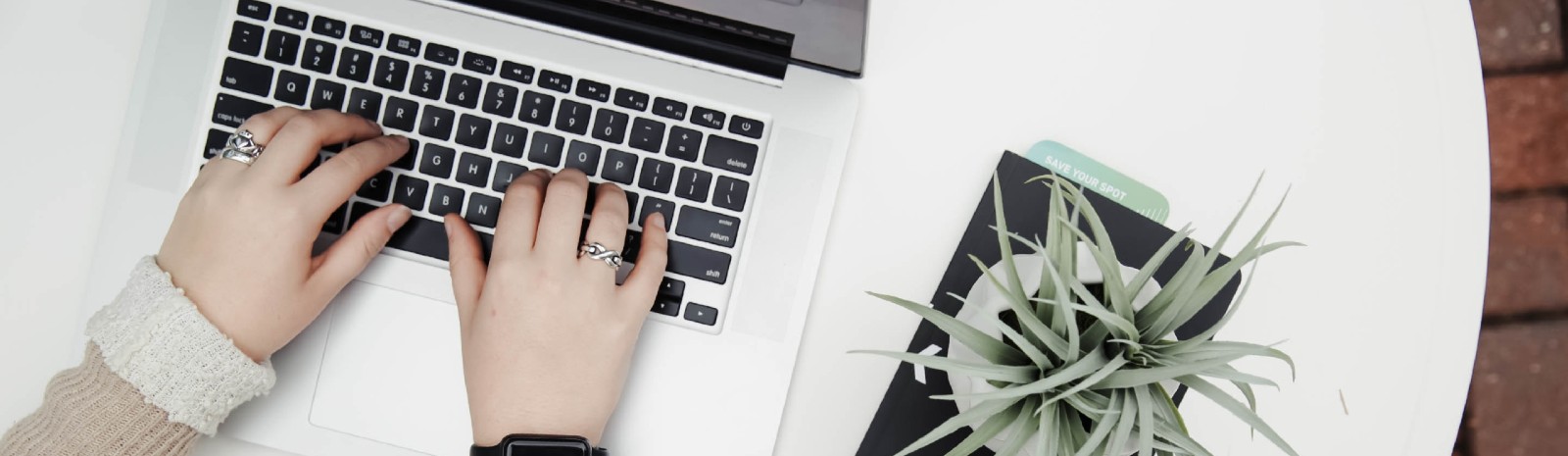 Stock image of lady typing on computer